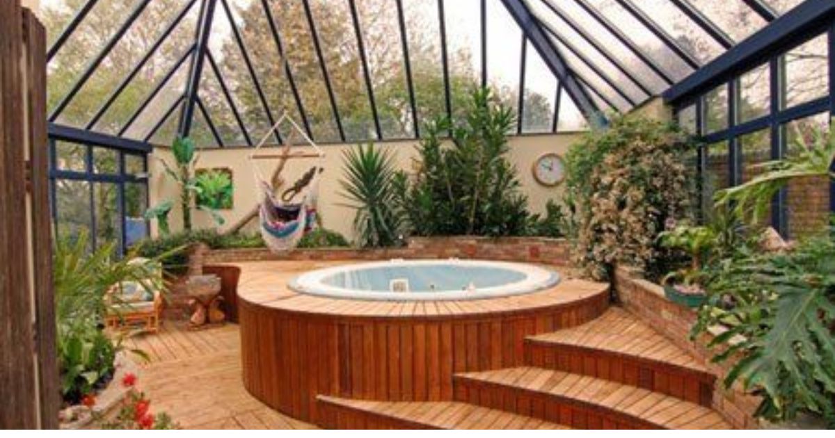 hot tub in a greenhouse